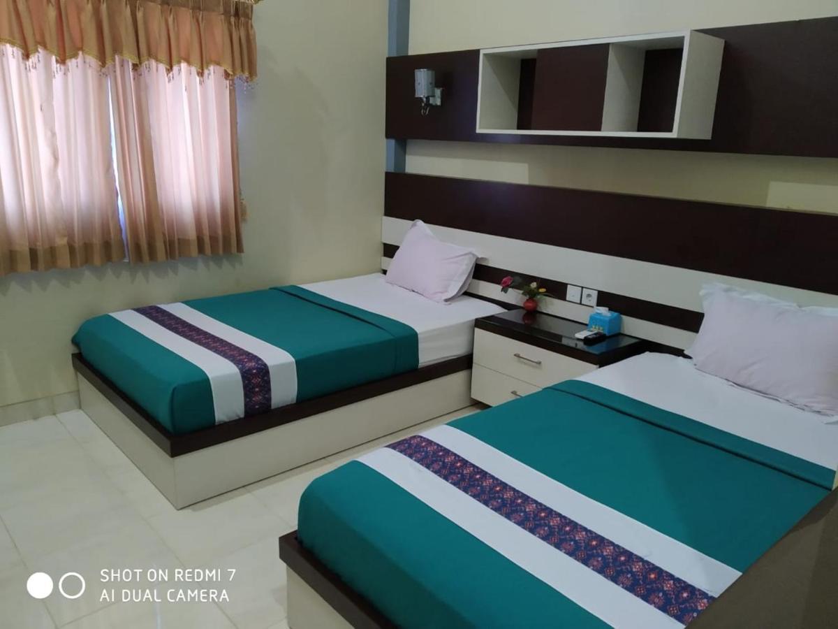 Hotel Pilar Mosa Muarawahau Екстер'єр фото