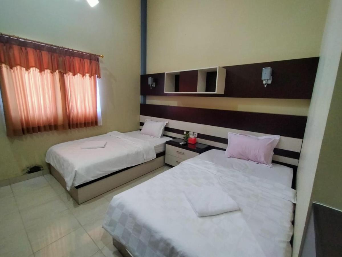 Hotel Pilar Mosa Muarawahau Екстер'єр фото