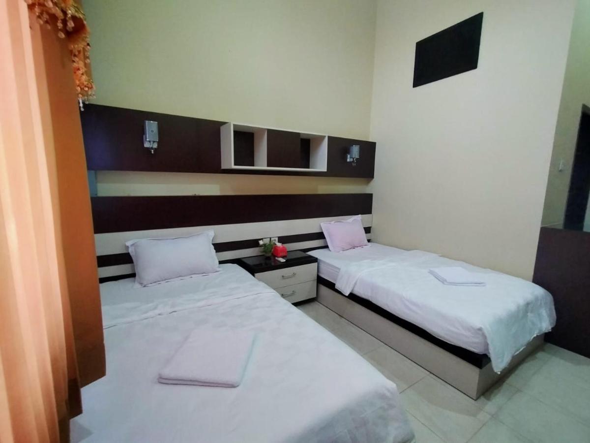 Hotel Pilar Mosa Muarawahau Екстер'єр фото